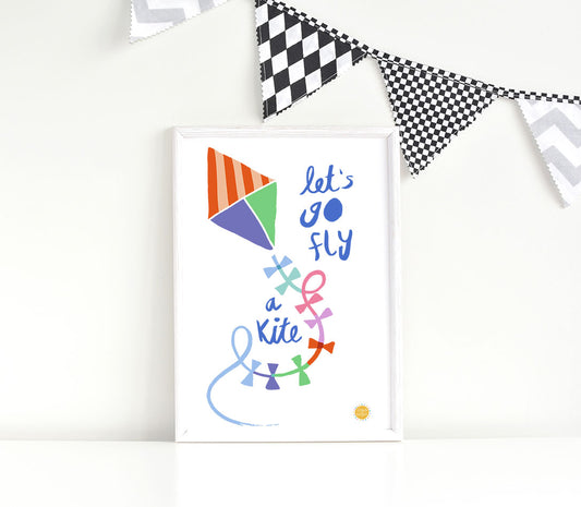 A4 Let's Go Fly a Kite Art Print with a white frame and bunting by Lilly & Bright