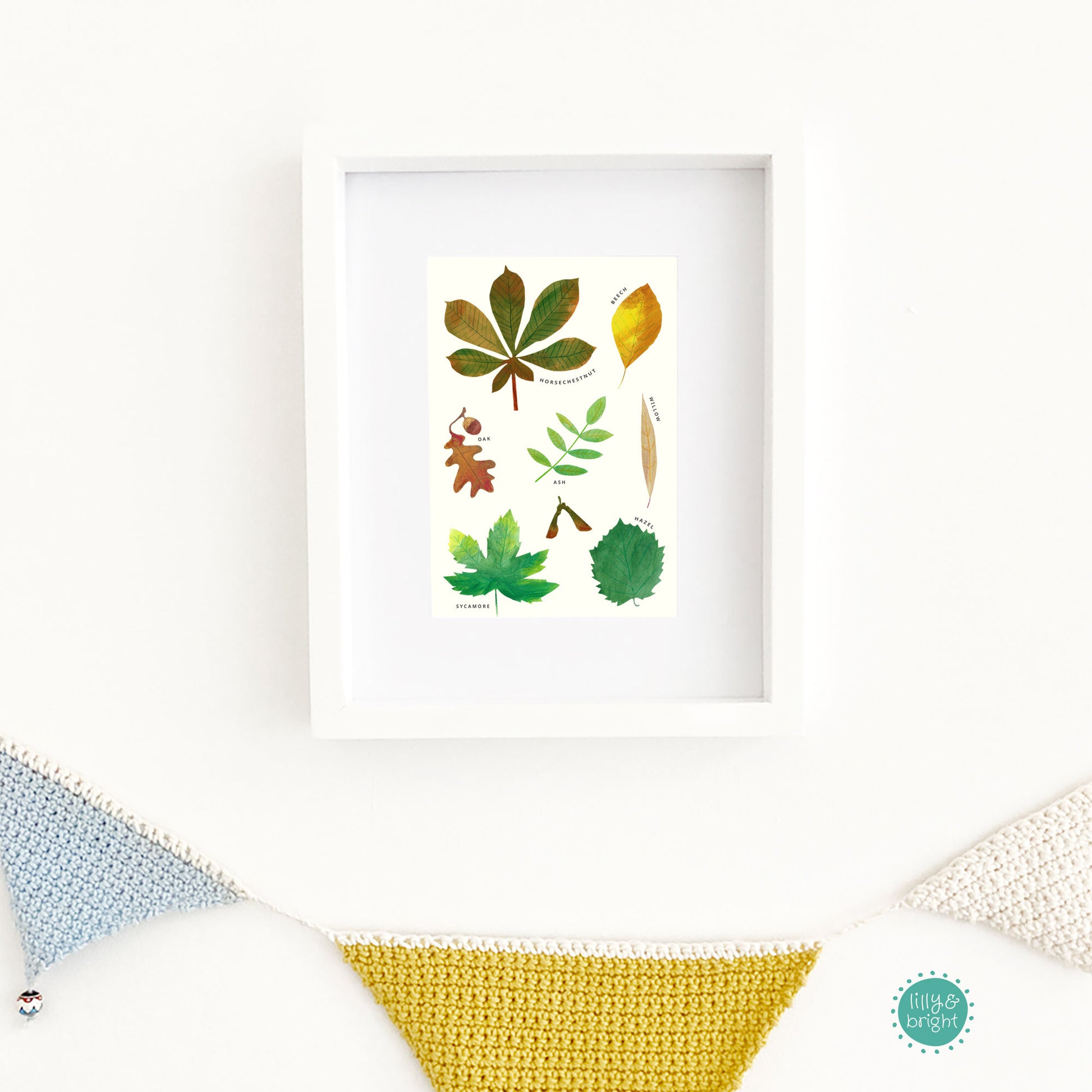 Framed artwork with leaf illustrations on a white background