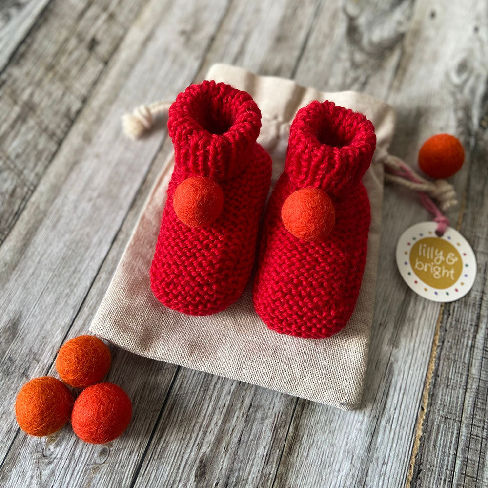 Hand knit Red Baby Booties by Lilly and Bright with a drawstring bag