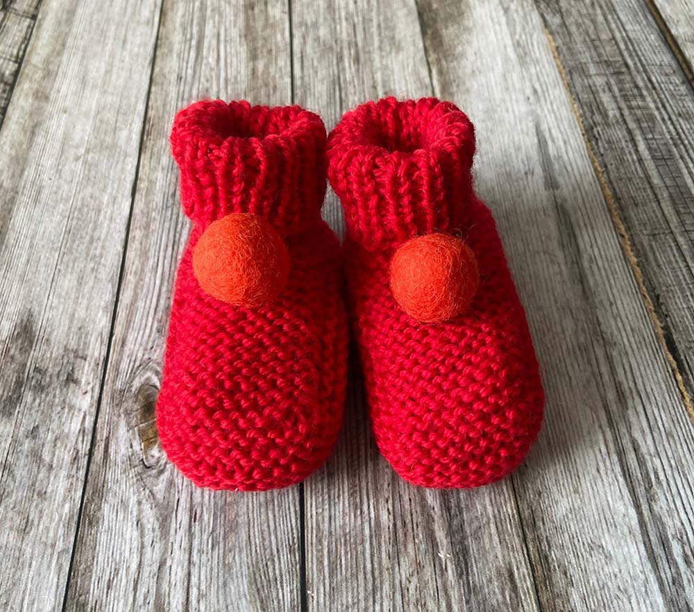 Hand knit Red Baby Booties by Lilly and Bright with pom pom