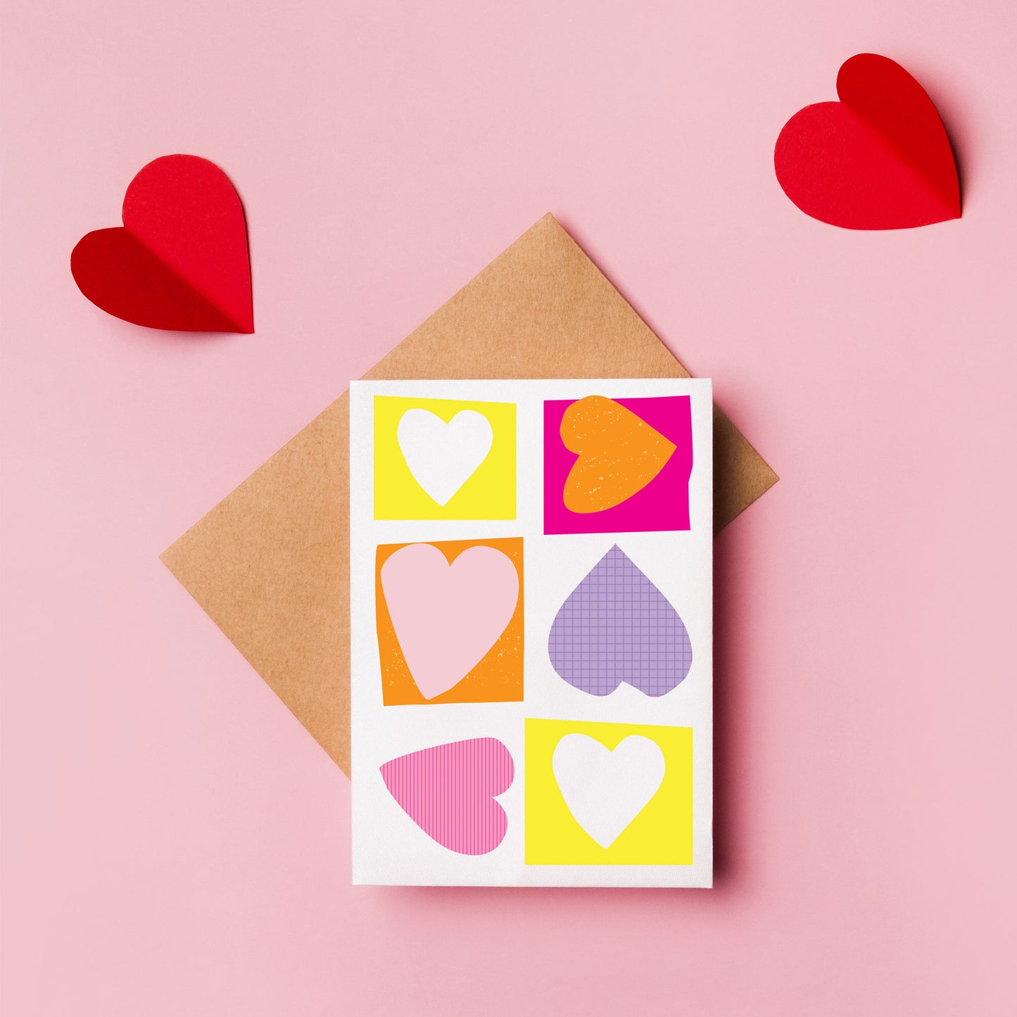 Lilly & Bright Hearts greeting card on pink background